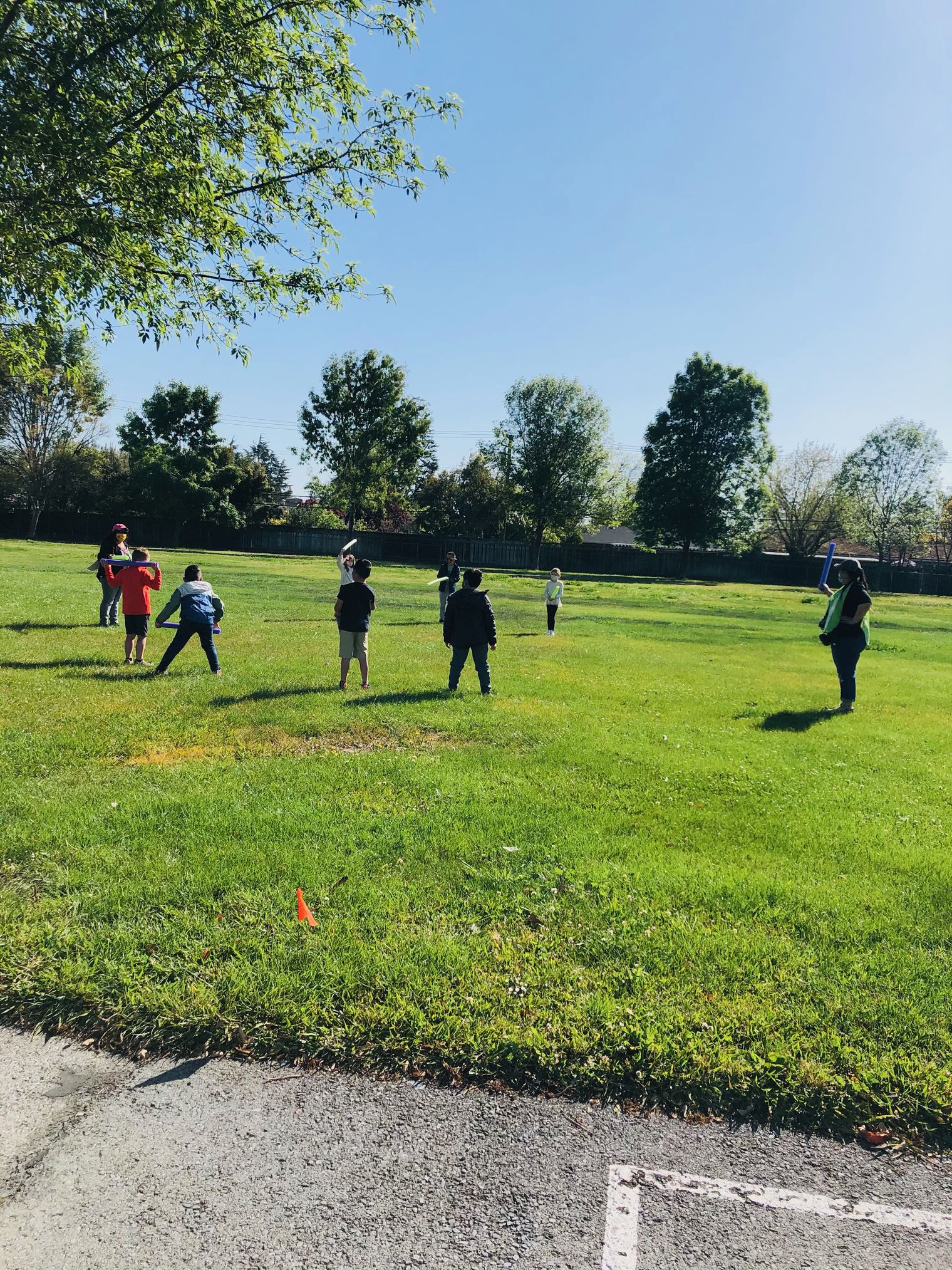 Children playing on a grassy field