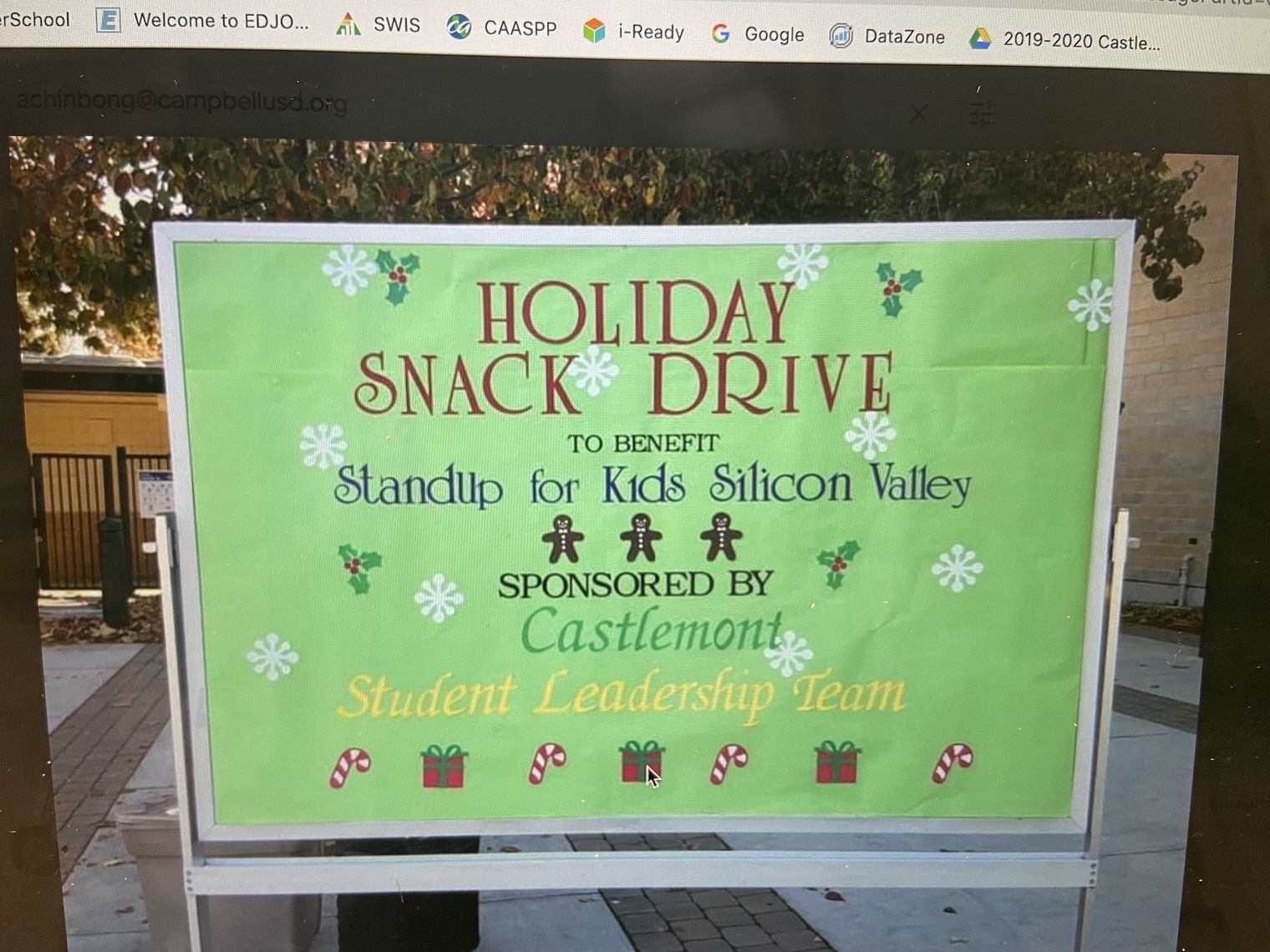 Green sign for Holiday Snack Drive