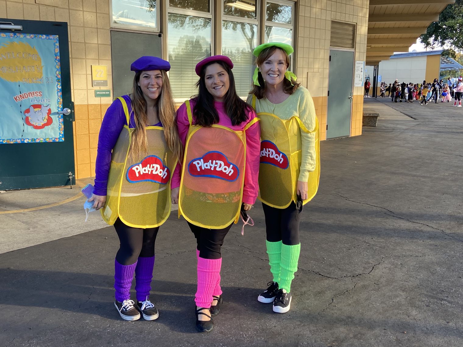 Three teachers dressed up as Play-doh