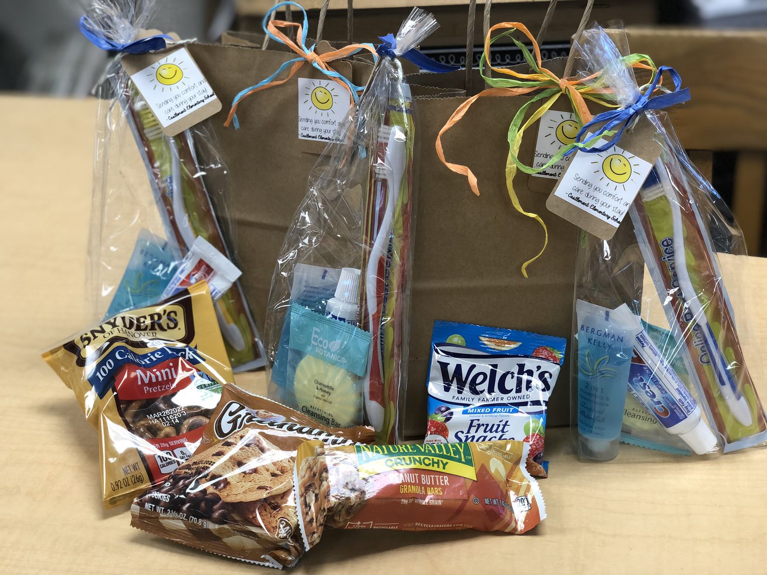 brown gift bags and packaged snacks