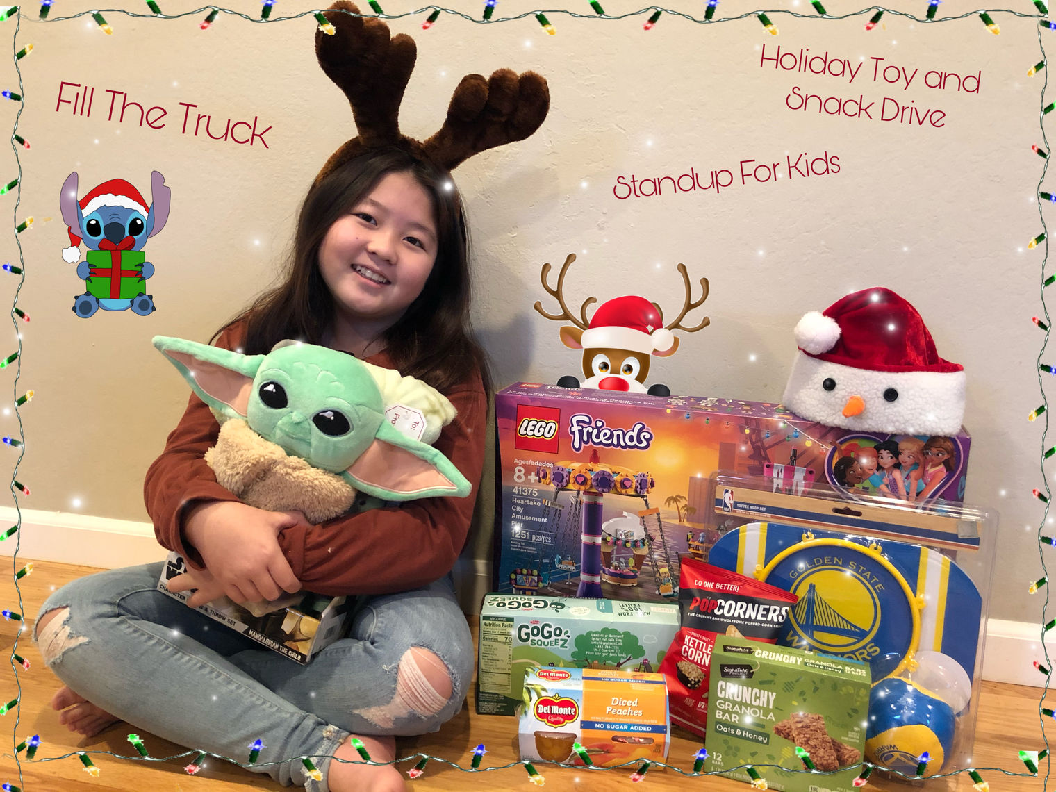Child holding toys