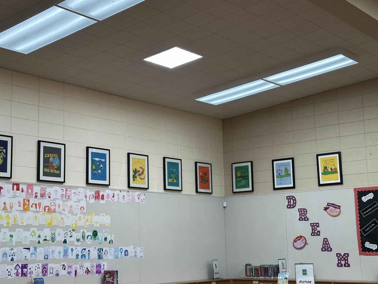 colored tshirts displayed on a wall