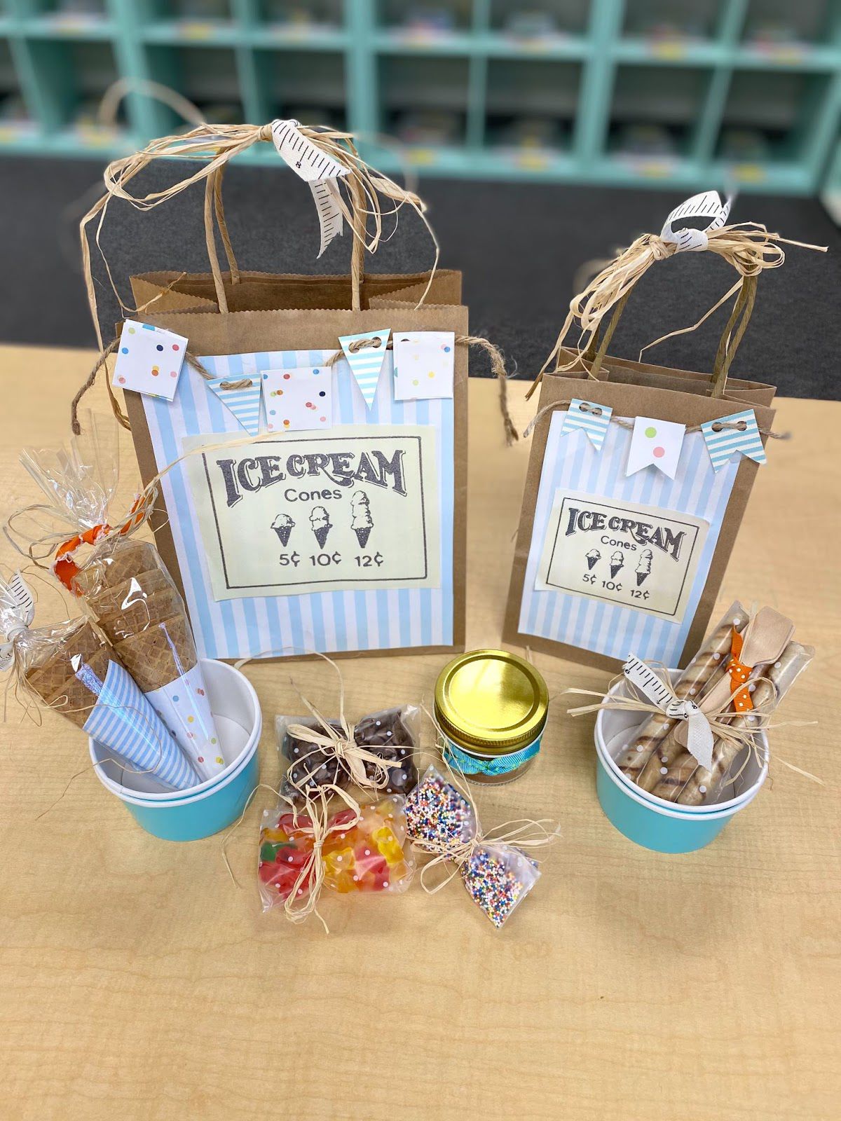 Two paper bags decorated with ice cream cones