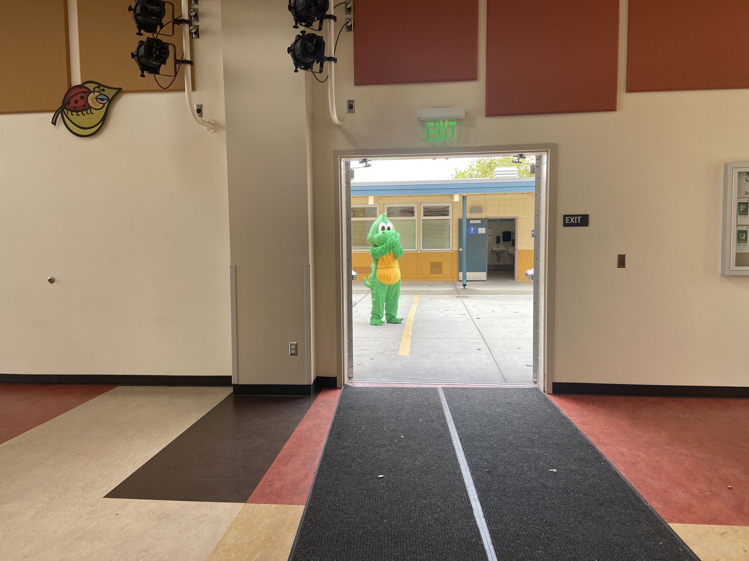 Dragon mascot in a doorway
