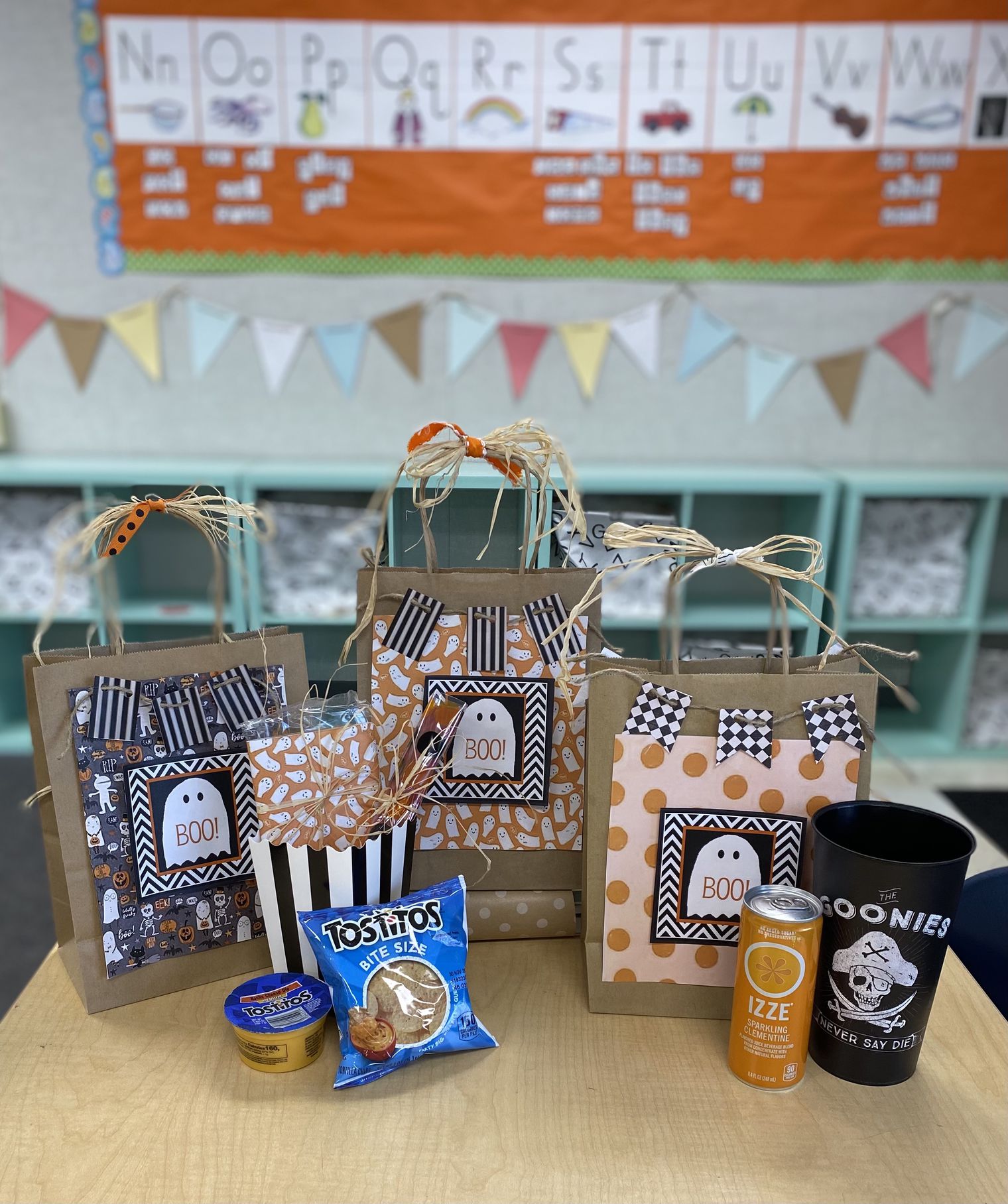 Three paper bags and a display of their content