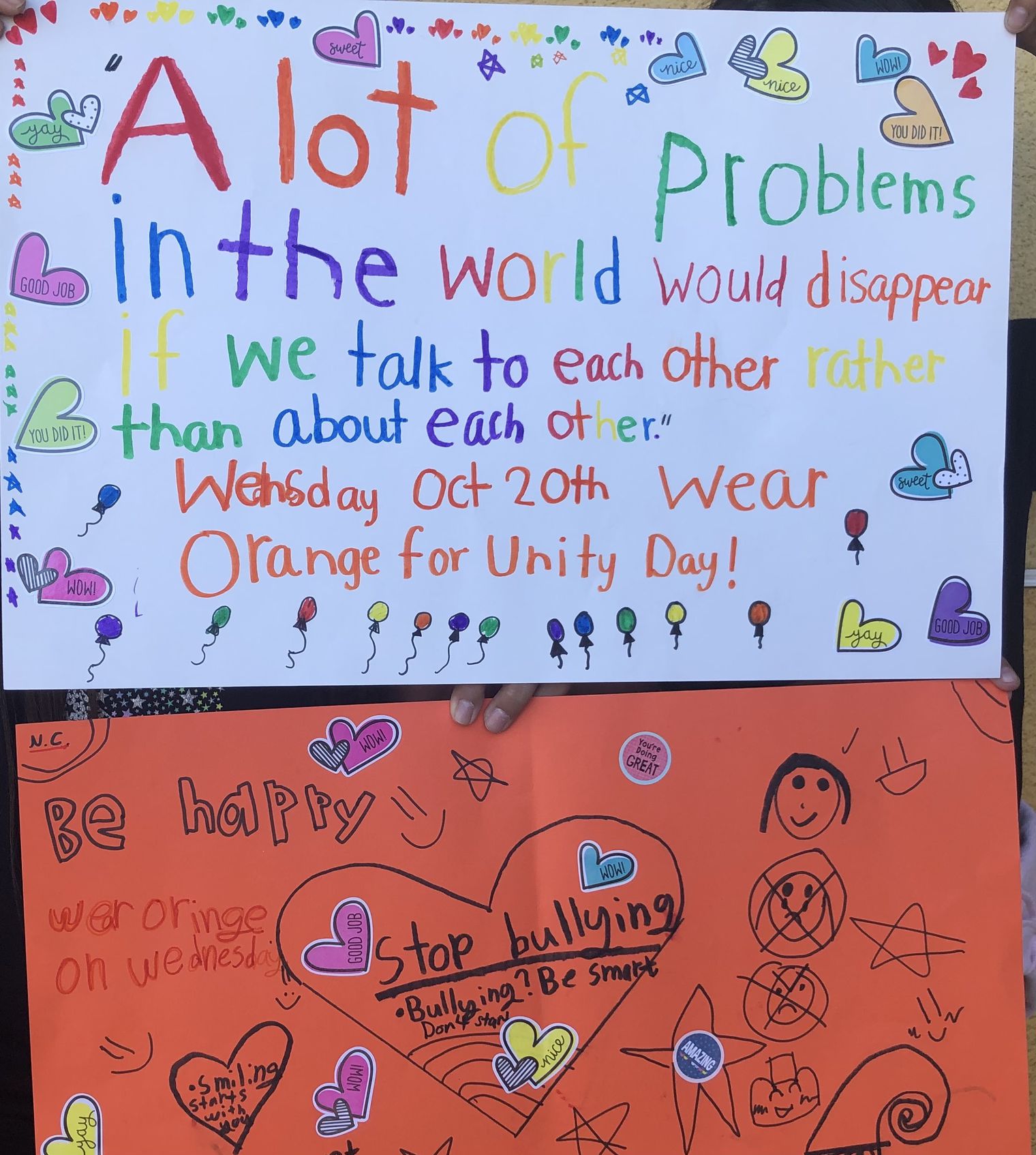 Hand lettered sign about Unity Day