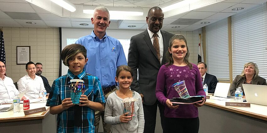 board members with students