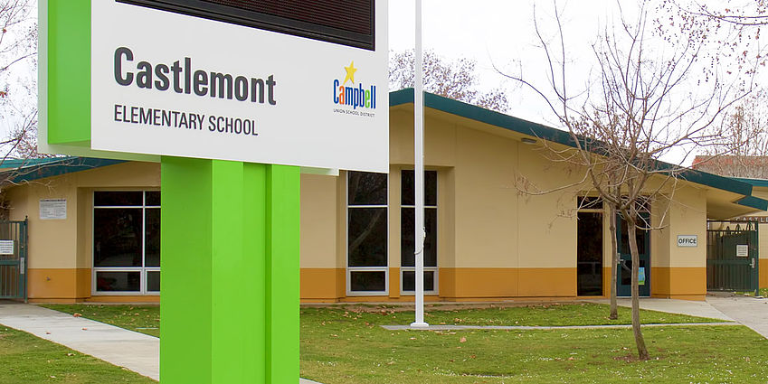 Front of Castlemont Elementary School including the school message board sign.