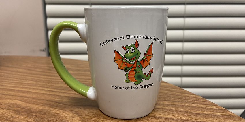 Coffee cup with a dragon on it