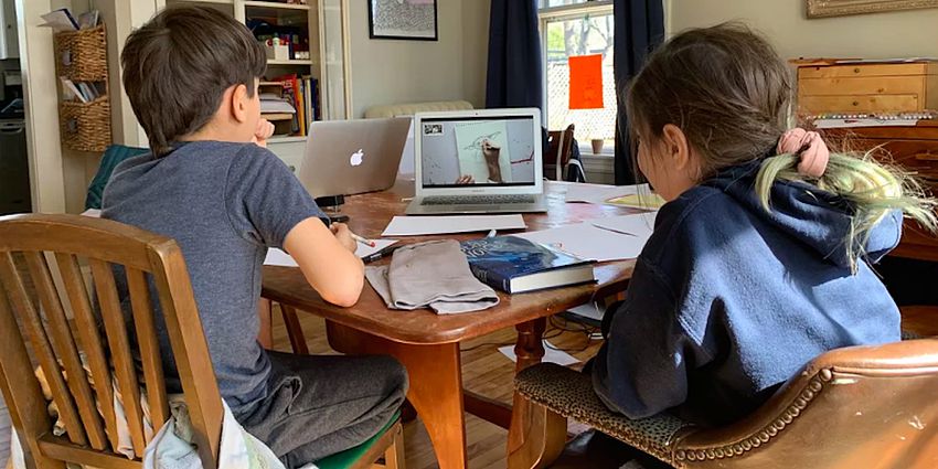 two students learning from home