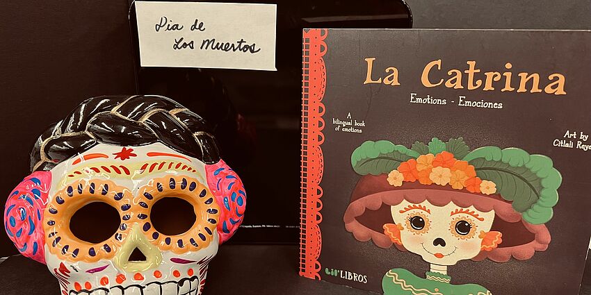 Book and a Catrina to celebrate Dia de Los Muertos