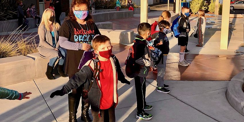 Teacher with students lined up