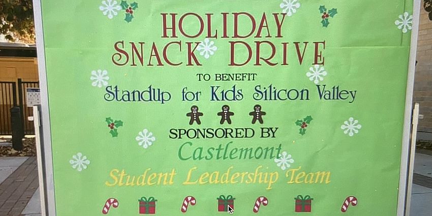 Green sign for Holiday Snack Drive