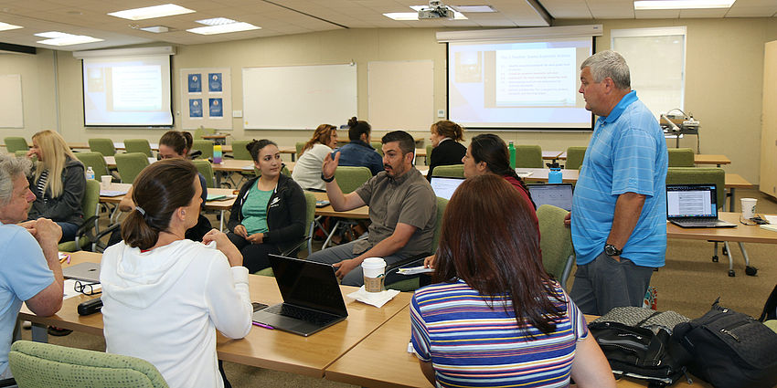 faculty discussing issues