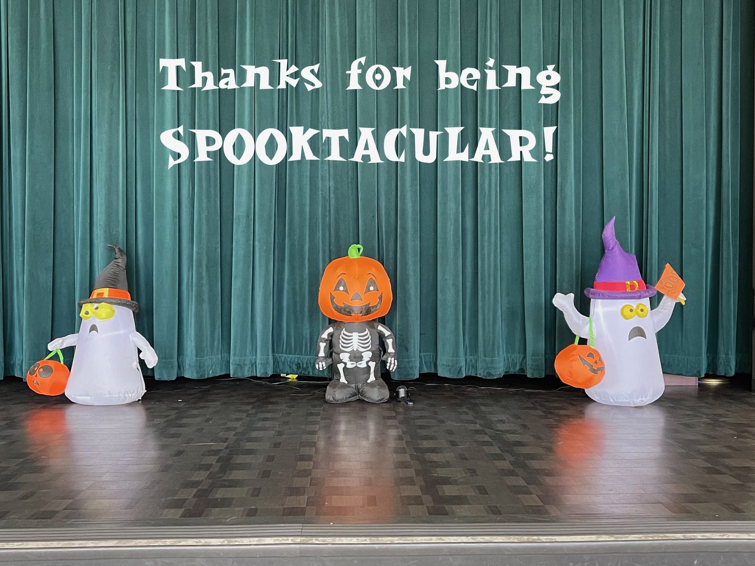 Ghost, Jacalanter on school stage with a note. "Thanks for being Spooktacular!"