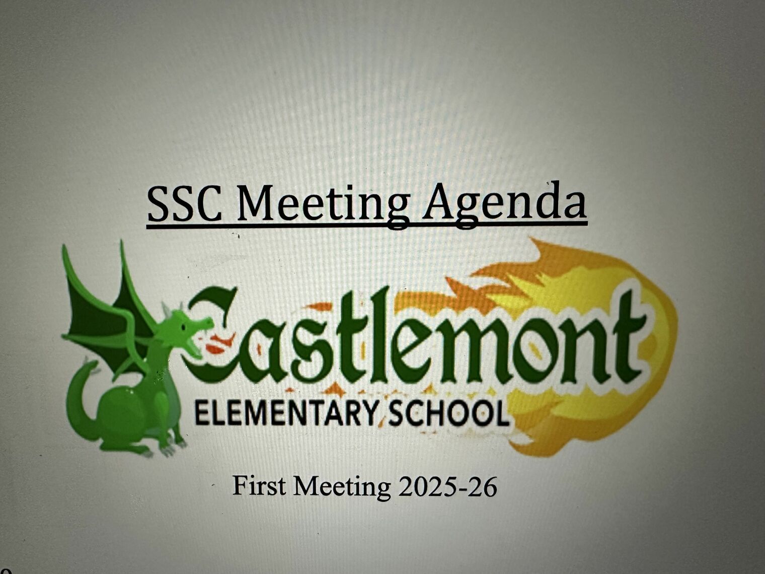 Illustrated dragon breathing fire behind the word "Castlemont"